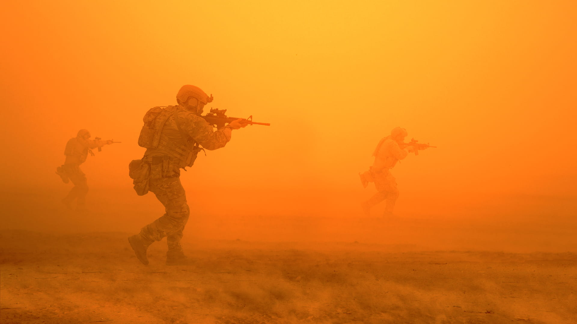 U.S. forces advance in hazy desert battlefield
