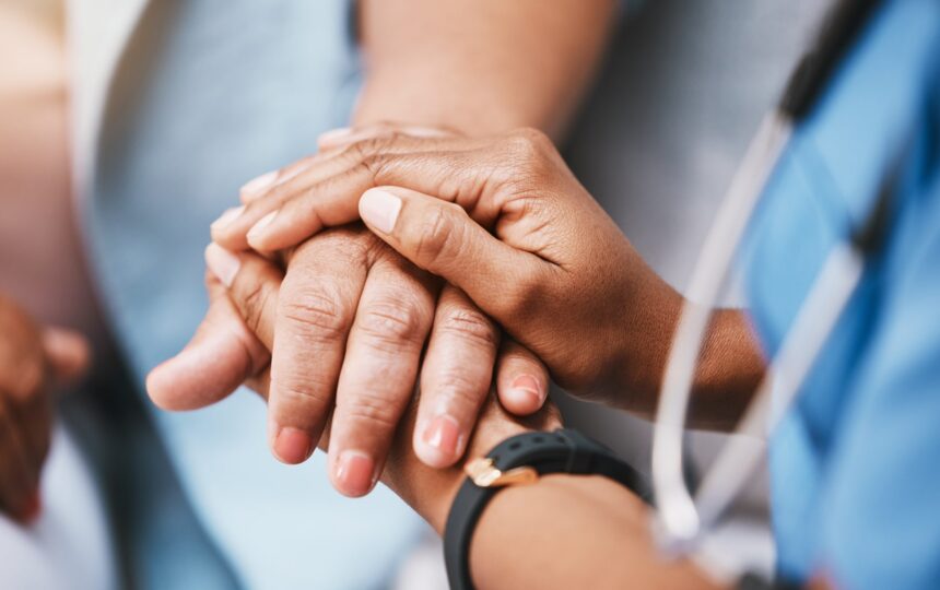 Doctor comforts patient