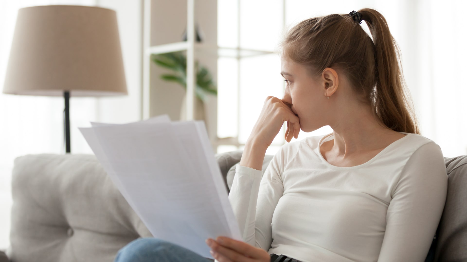 A woman reviews her student loan debt